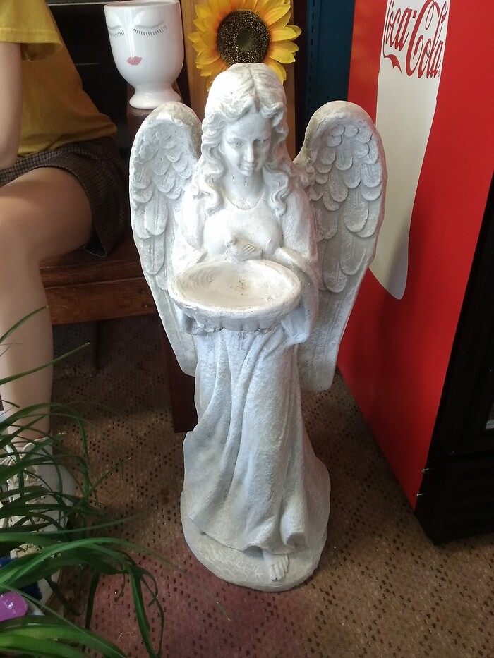 Angel with bird feeder