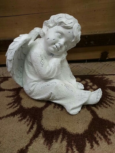 Resting on knee angel