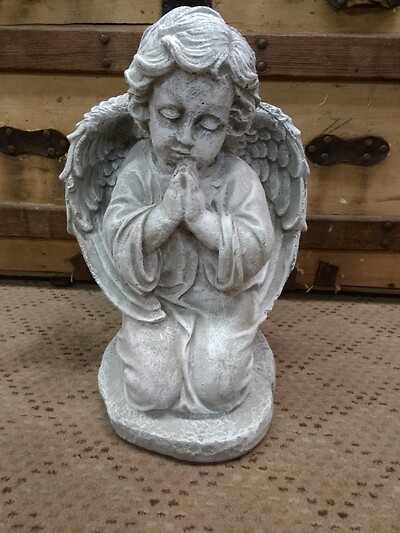 Sitting angel with planter